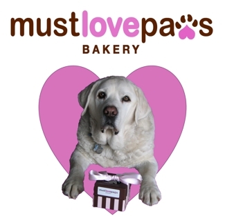 Joey with his Must Love Paws Bakery gift