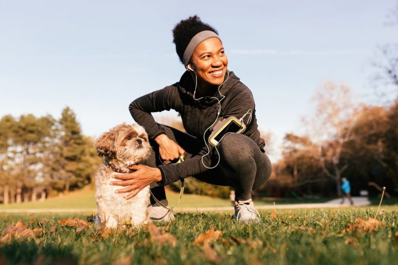 woman ready to exercise with her dog