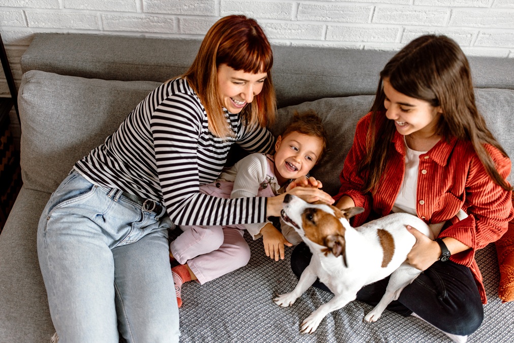 Family spending time together with a dog