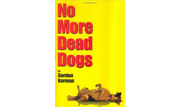 Cover art for No More Dead Dogs. A German Shepherd lies on his back in front of a yellow background.