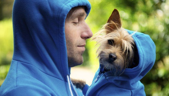Human and dog wearing matching hoodies. Happy Dress Up Your Pet Day!