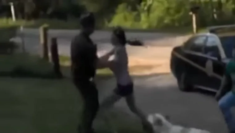 woman-arrested-stop-police-shooting-dog-2