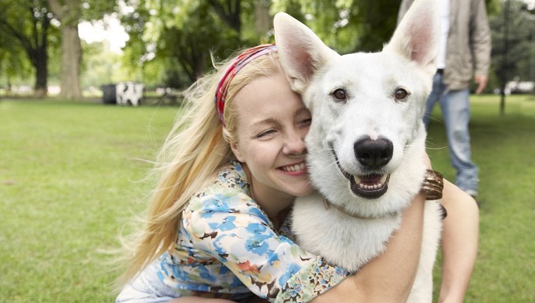 blonde, girl, floral shirt, white dog, grass, trees, park, summer fun, pets, real people