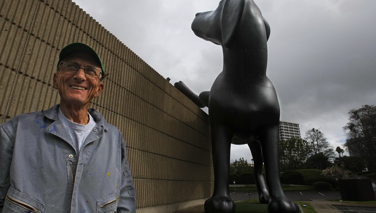 JANUARY 8, 2013. NEWPORT BEACH, CA. Installation artist Richard Jackson outside the Orange County Museum of Art in Newport Beach with his sculpture, "Bad Dog, 2013". Opening Feb 17 inside the museum is an extensive retrospective of his mechanical sculptures and paintings. (Photo by Don Bartletti/Los Angeles Times via Getty Images)