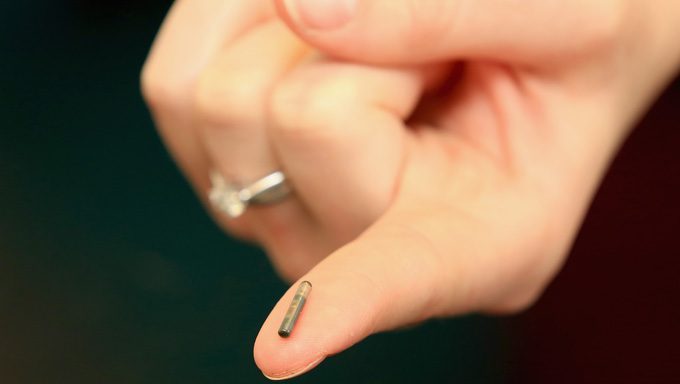 microchip on a finger