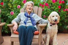 Senior Woman Talking to Service Dog