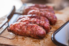 Traditional Argentinian 'chorizo asado' (grilled chorizo), that can be eaten alone or in sandwich (known as choripan).