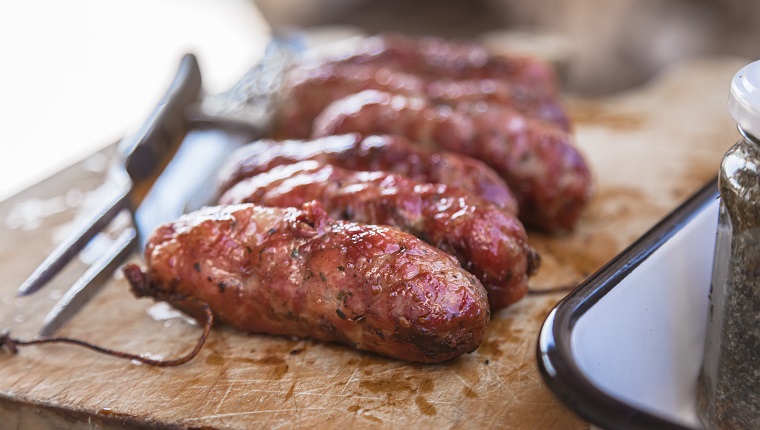 Traditional Argentinian 'chorizo asado' (grilled chorizo), that can be eaten alone or in sandwich (known as choripan).