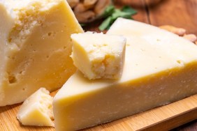 Pieces of matured pecorino romano italian cheese made from sheep milk in Lazio, Sardinia or Tuscany close up