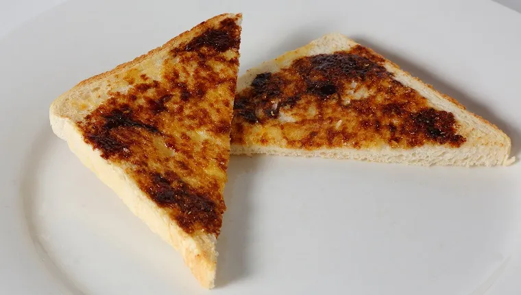 Vegemite toast cut into triangles.