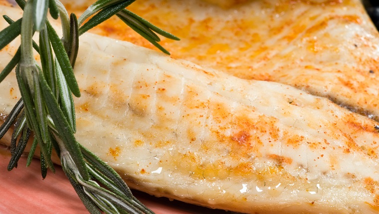 Close up picture of a saute fillet of white fish