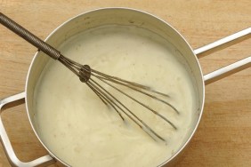 topview pan with béchamel sauce, made with butter, flower, milk and nutmeg