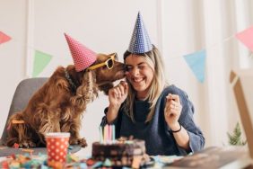dog and owner celebrating birthday dog years