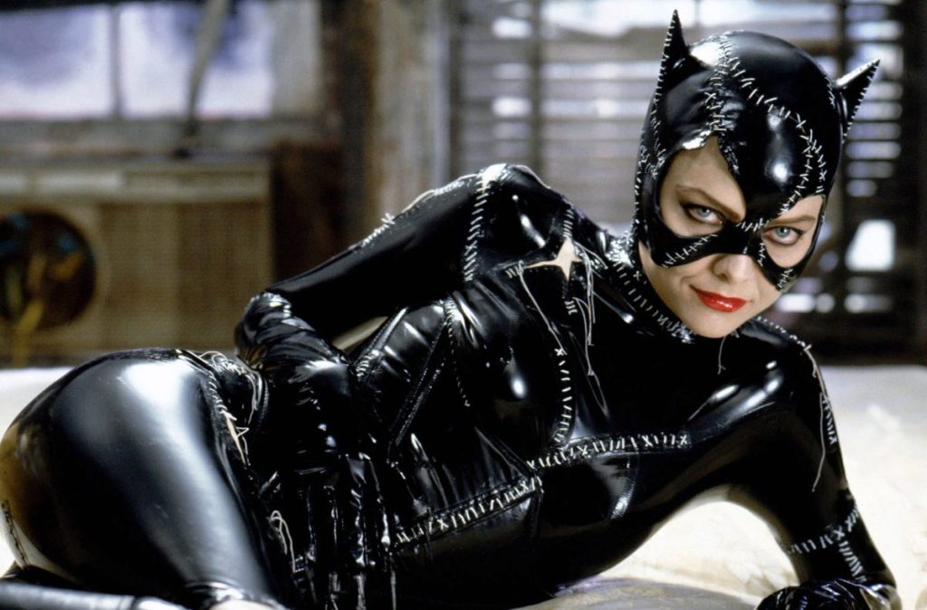 Actress Michelle Pfeiffer, a rescue dog mom, on set of Batman Returns dressed as Catwoman, wearing a catsuit.