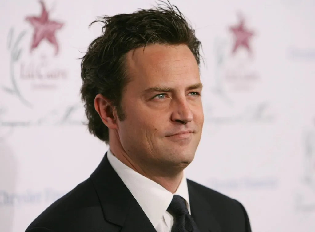 close-up of actor Matthew Perry in suit