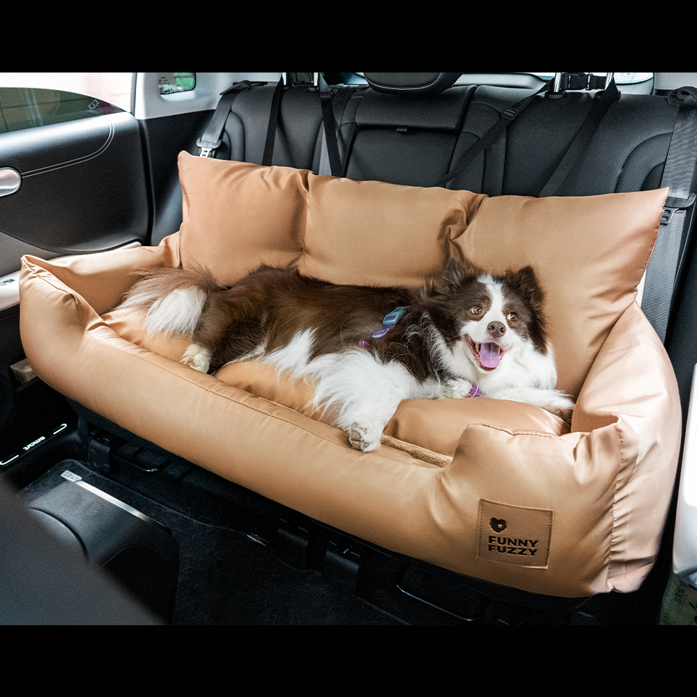 Brown dog car seat.