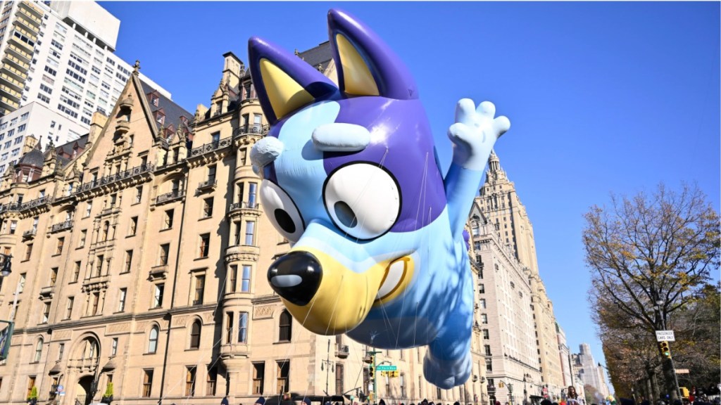 Bluey character balloon in parade, Disney+ is going to stream Bluey special episodes globally.