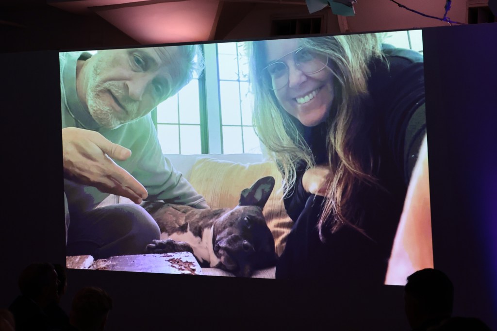 NEW YORK, NEW YORK - MAY 18: Jon Stewart and Tracey Stewart speak to guests remotely with their rescued dog, Dipper at the Animal Haven Gala 2022 at Tribeca 360 on May 18, 2022 in New York City. (Photo by Jamie McCarthy/Getty Images for Animal Haven)