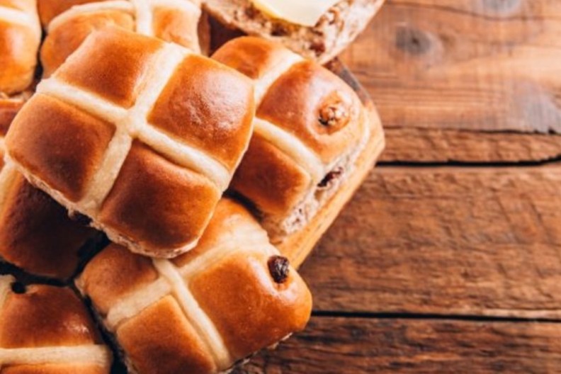 Easter breakfast with hot cross buns.