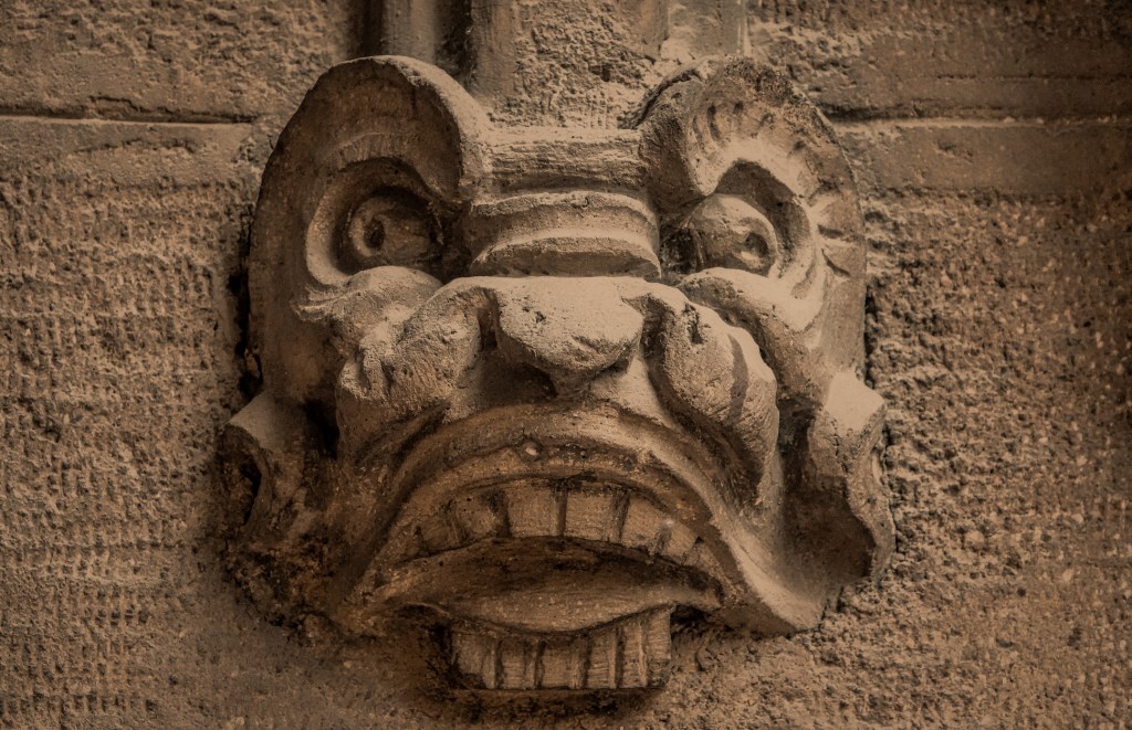 Close-up sculpture of Xolotl, a mythological dog-headed Aztec god