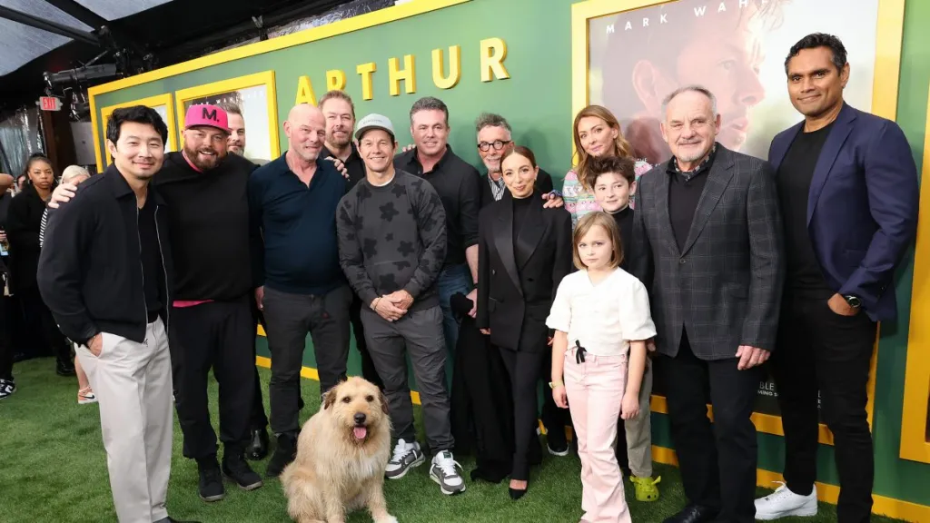 The cast of "Arthur the King" including the dog, Ukai, and Mark Wahlberg.