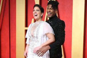 Jon Batiste with wife at Vanity Fair Oscar Party, the couple recently adopted a rescue dog.