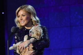 Talk host Kelly Ripa on stage carrying a dog, Kelly Ripa recently opened up about her senior dog's struggles
