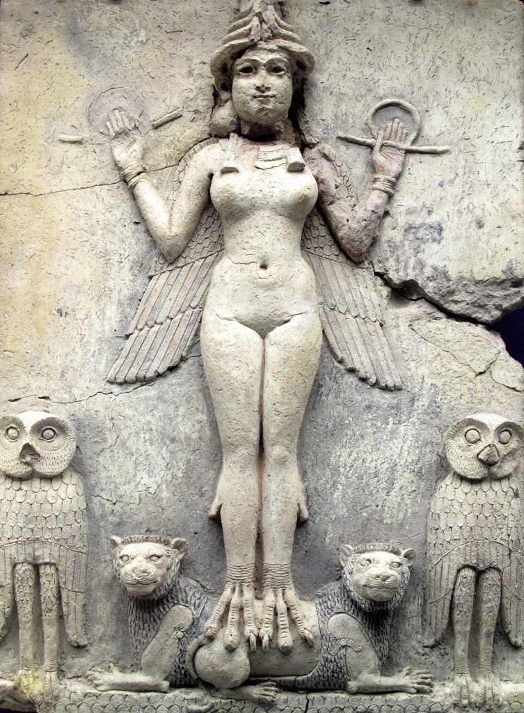 Photograph of an Ancient Babylonian figure dating from between 1792 and 1750 BC, perhaps a goddess. The figure stands on two doglike creatures.