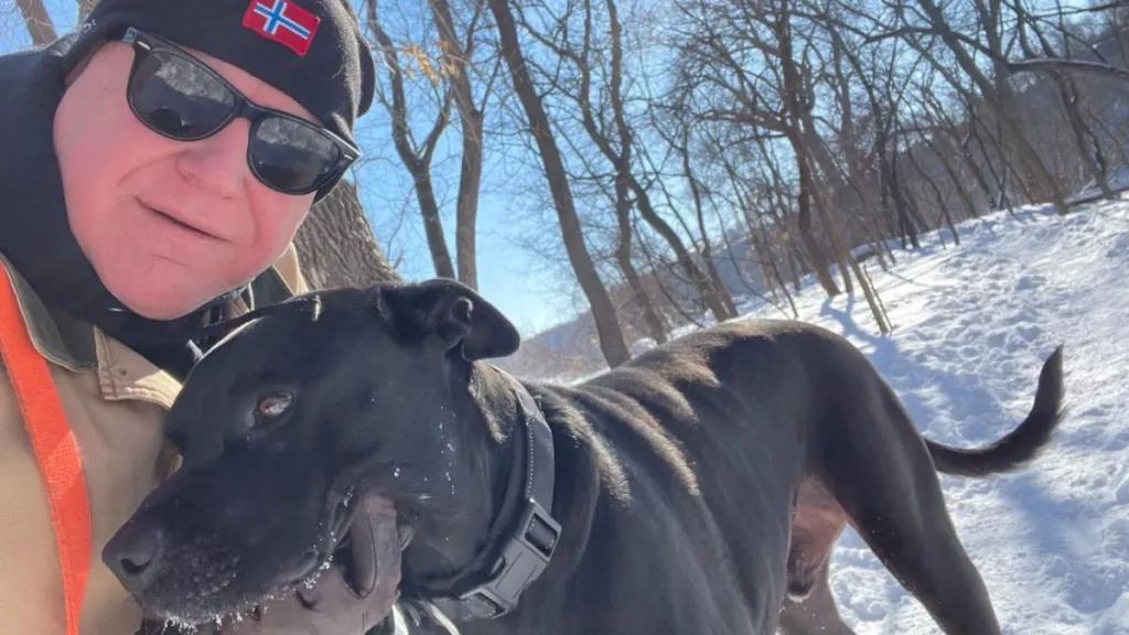 Tim Walz with his beloved dog, a Labrador Retriever named Scout.