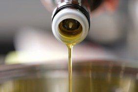 A closeup shot of canola oil, which dogs can eat in small amounts..