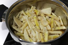 Prepared bamboo shoots in a metal bowl.