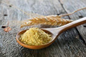 Wheat germ in wood spoon