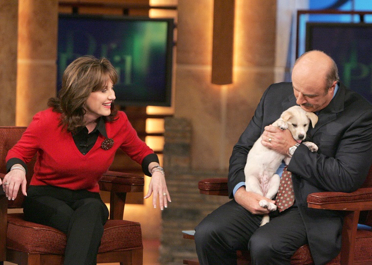 Dr. Phil And His Wife Robin Welcome Their New Rescue Dog Maggie